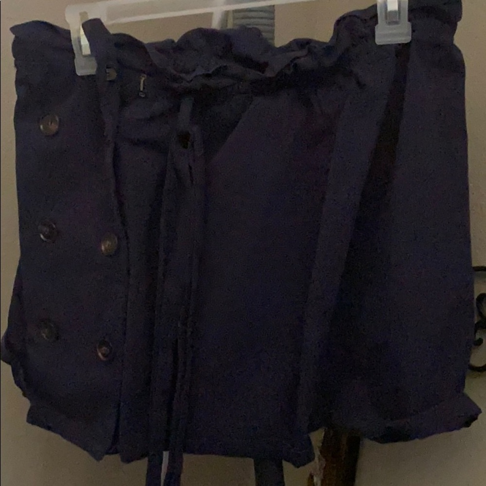 Navy paper bag skirt.